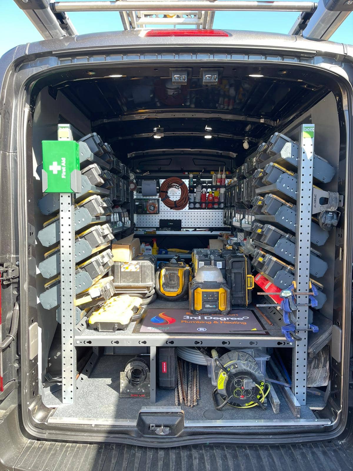 van interior fitted with bott van racking - van racking accessories - loaded with tools & components