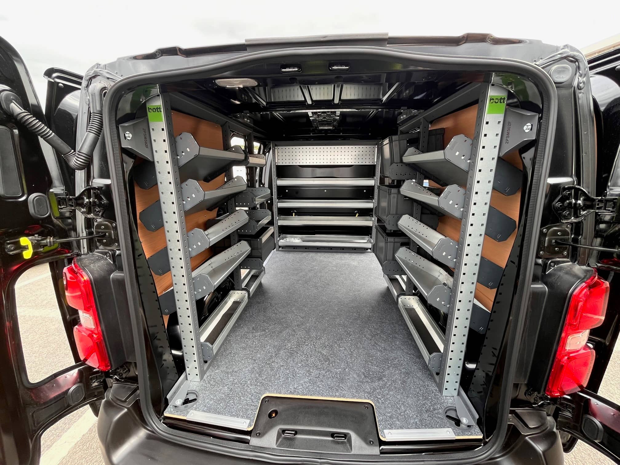 rear view of van racking featuring van shelving and anti slip van flooring