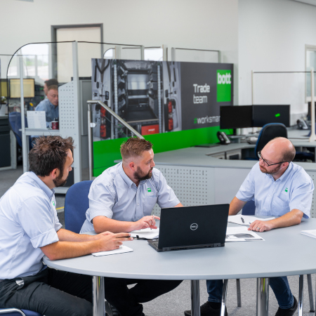 Customer service representatives at a table