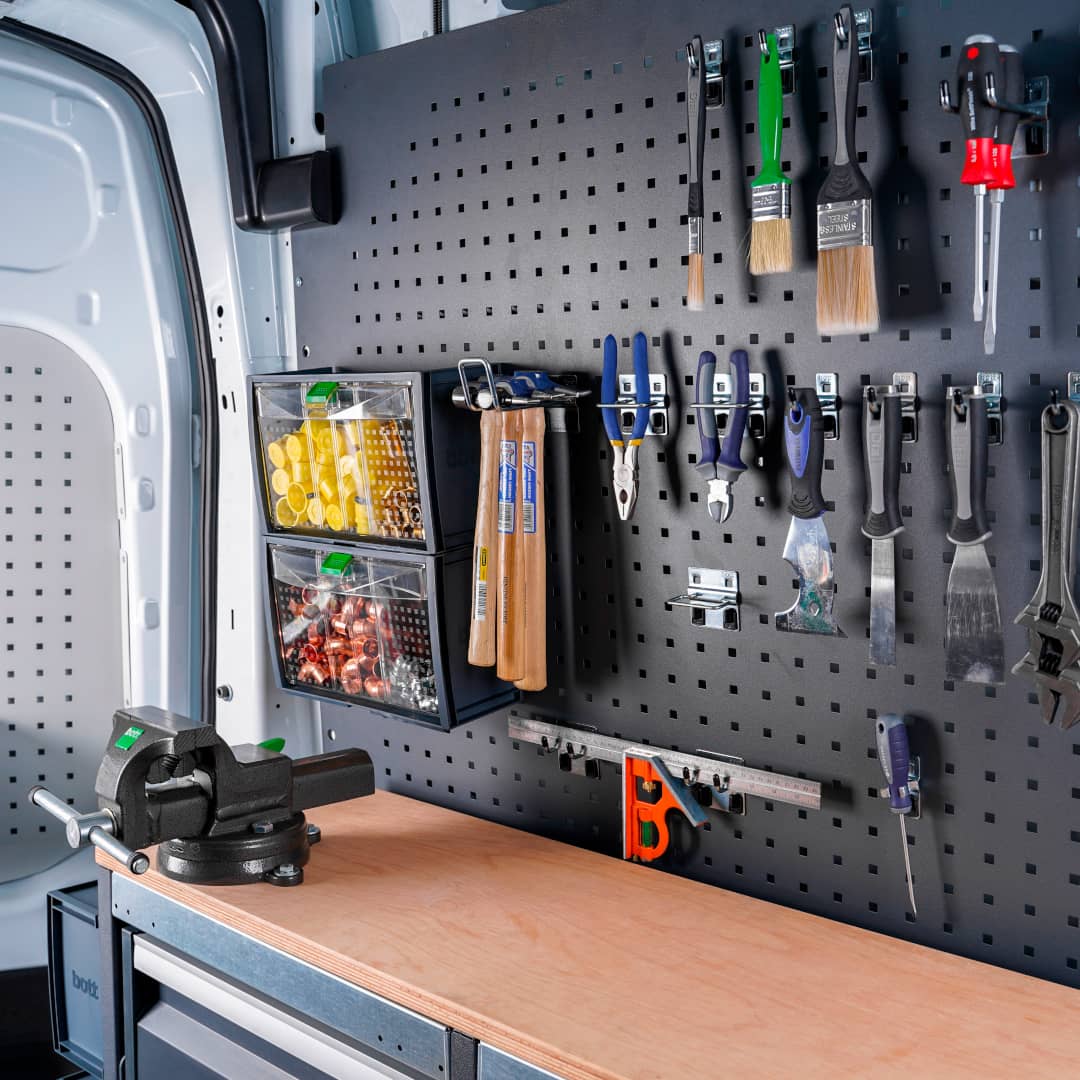 Tools hanging on a vehicle perfo panel