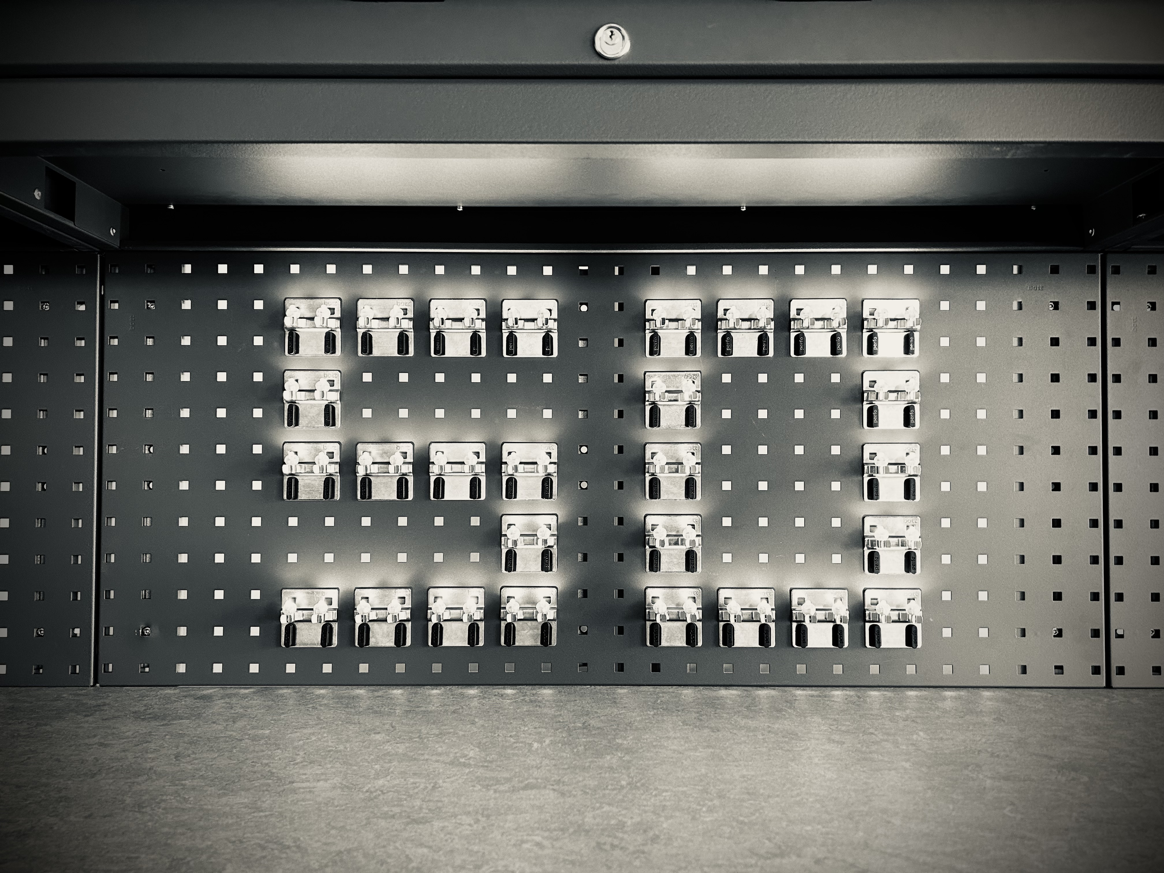 perfo panel with perfolocks spelling out the number 50
